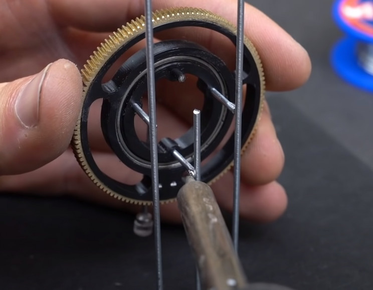 metal ball machine ring in place