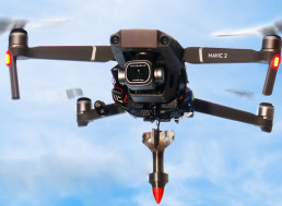 A New DIY Laser-Guided Drone System Can Drop Metal Darts for $1,000
