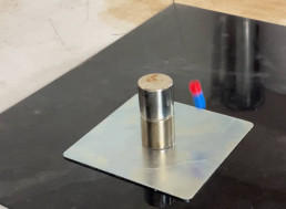 Is It Possible for Two Magnets to Orbit Each Other?