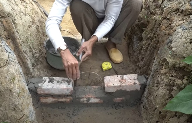 diy dam irrigation system bricks