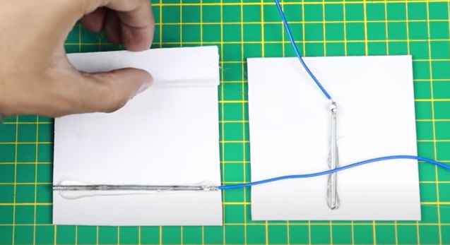 diy mousetrap stack of boards