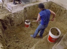 Watch a Man Dig out a 100-Year-Old Basement With His Bare Hands
