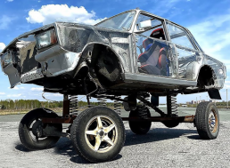 Mechanics Turn a Lada Into a Giant Bobble Head Toy