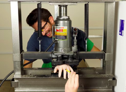 Engineer Tricks His Brain Into Believing His Hand Is Being Crushed By a Hydraulic Press