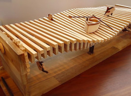 Man Builds Mesmerizing Hand-Cranked Wooden Kinetic Wave Sculpture