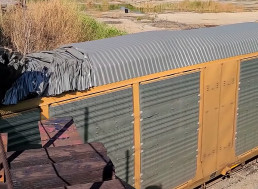 Train Full of Cars Tries To Go Under a Bridge, Causes $2 Million Damage