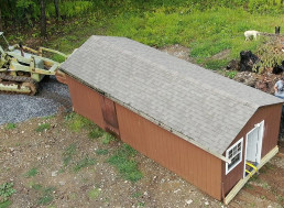 How To Use a Track Loader To Drag a Shed To a New Location