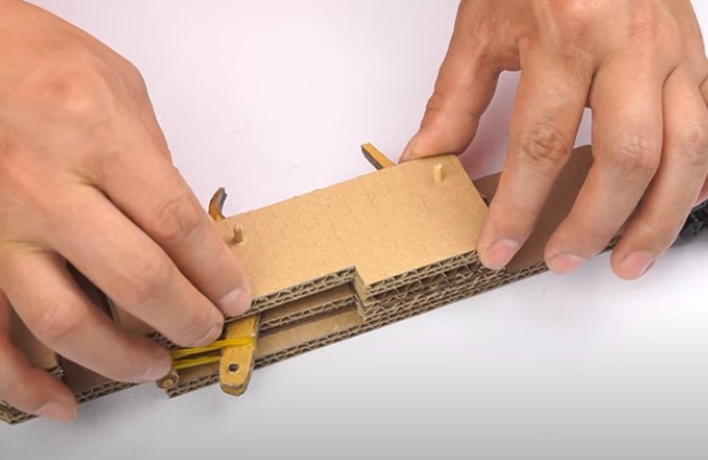 diy cardboard gun spring cover plate