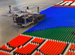 Ex-NASA Engineer Builds Record-Breaking Domino Robot In Five Years